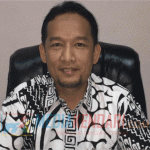 Kepala OJK Sultra, Fredly Nasution saat ditemui di ruang kerjanya, Jumat (11/1/2019). Foto : Indiana/mediakendari.com