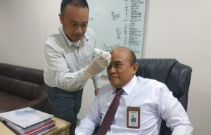 BNI Kendari Berlakukan Pengecekan Suhu Tubuh Nasabah dan Pegawai