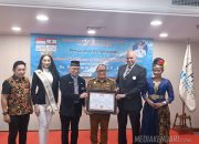 Pj Bupati Harmin Ramba Dianugerahi International Certificate of Excellence and Recognition